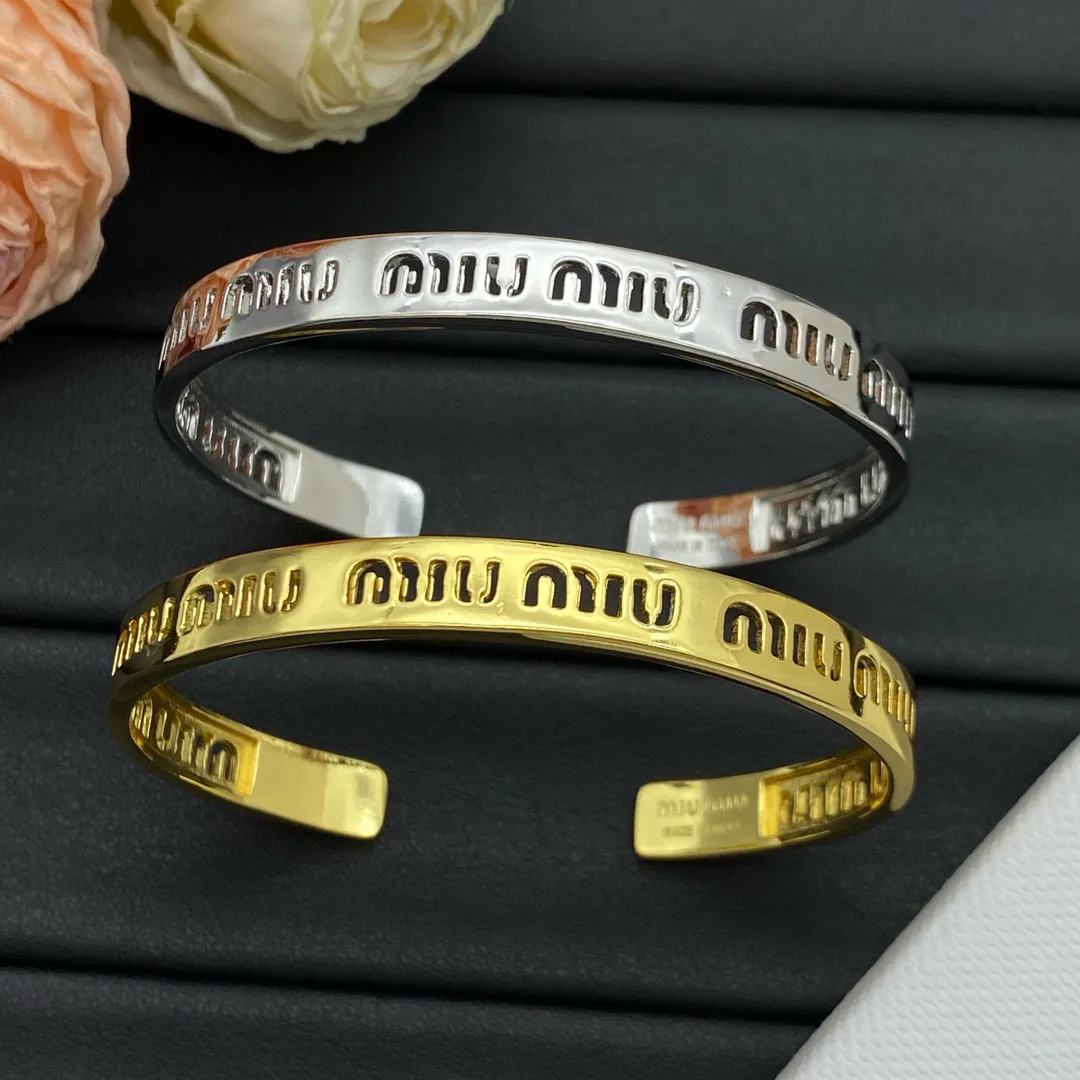 Miu Miu Logo Engraved Cuff Bracelet Metallic Jewelry Silver and Gold