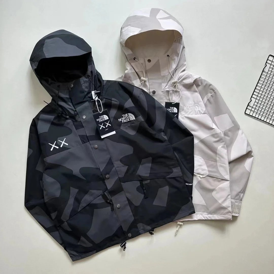 The North Face TNF KAWS Mountain Jacket Camo Windbreaker Black and White